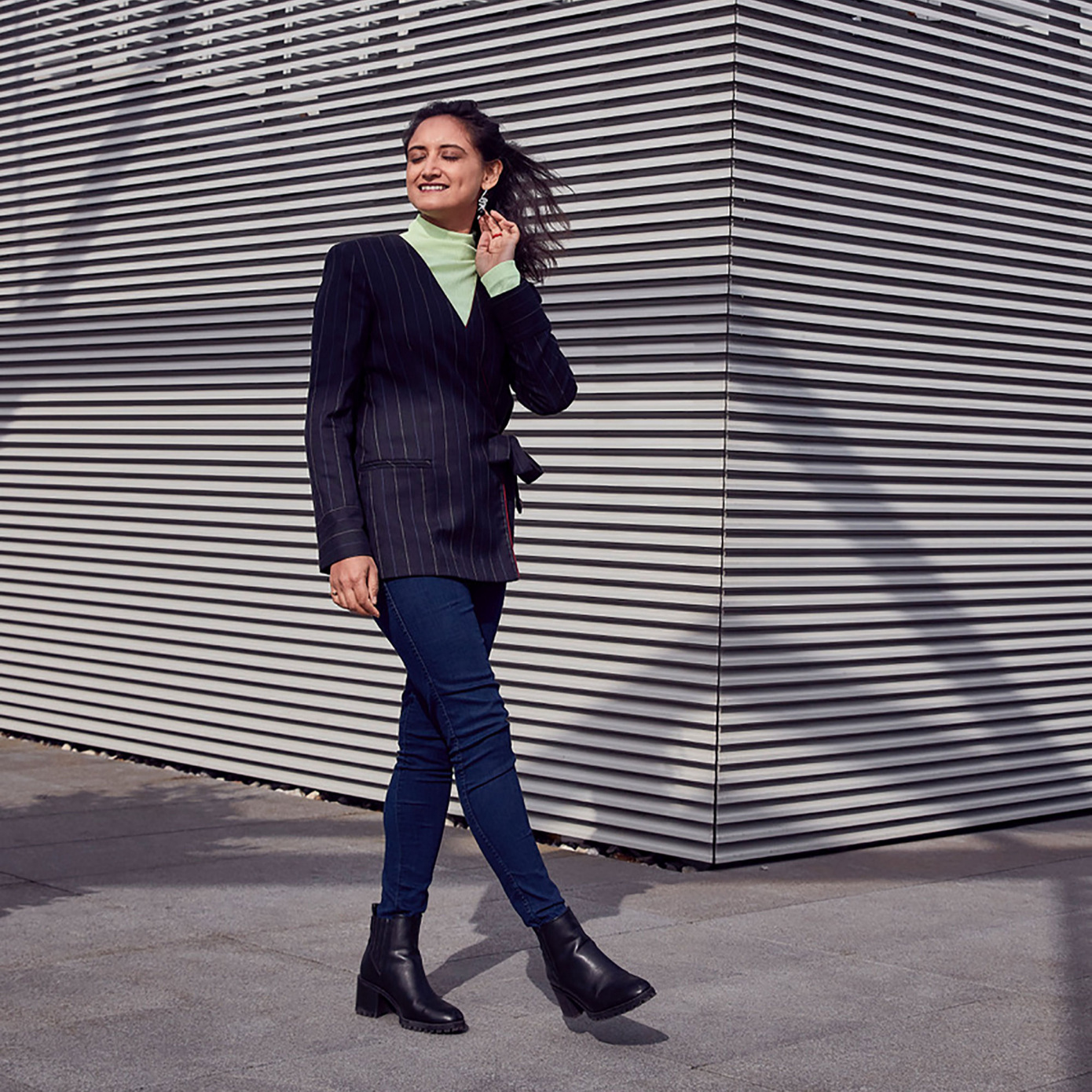 woman in front of building