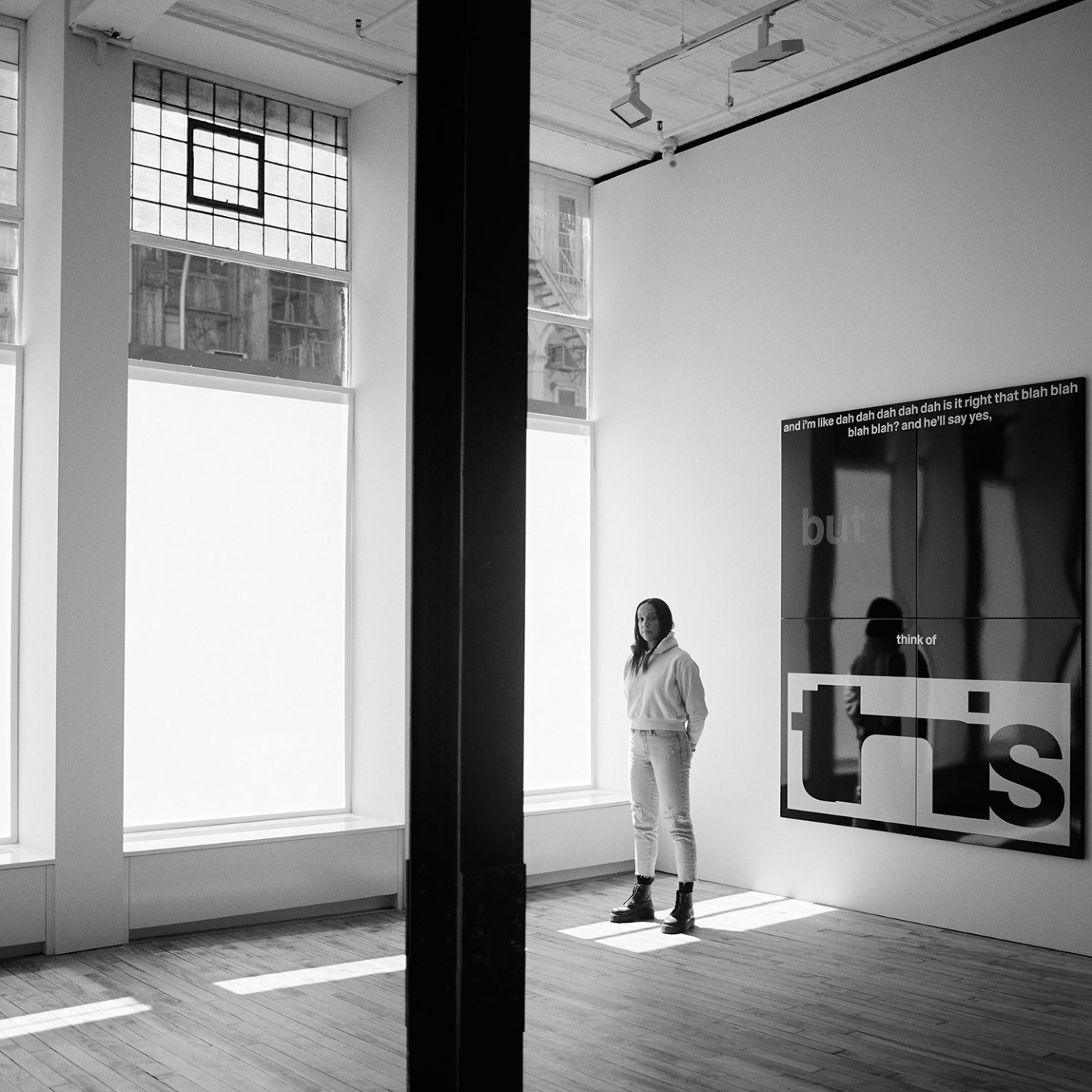 woman standing in gallery
